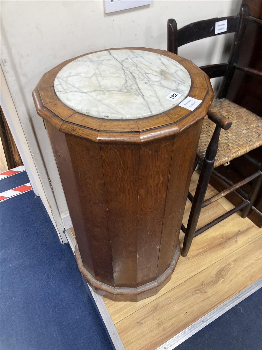 A Victorian oak marble top cylinder bedside cabinet, diameter 40cm height 77cm